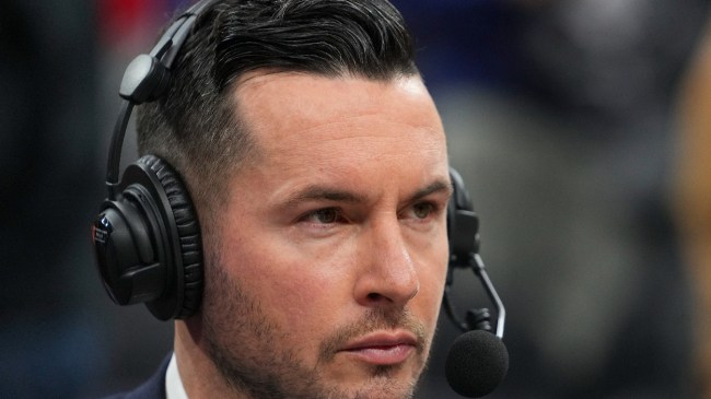 JJ Redick wears a headset during a basketball broadcast.