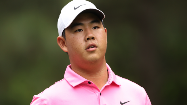 Tom Kim watches a shot.