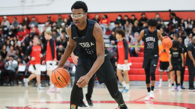 Bryce James warms up before a game.