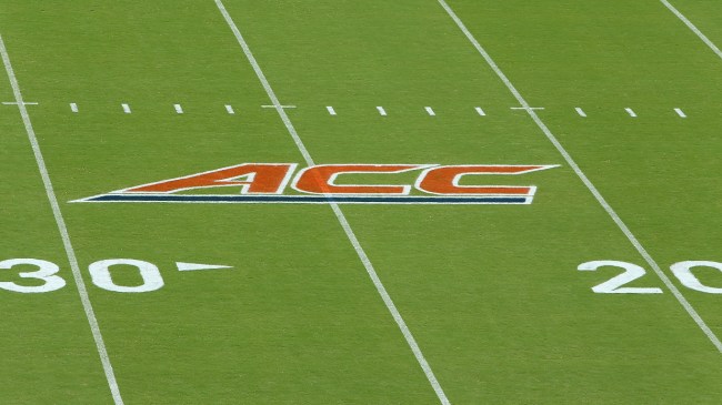 A ACC logo on the football field.