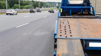 Driver Uses Tow Truck Ramp To Launch Over Highway Like A Stunt Devil (Video)