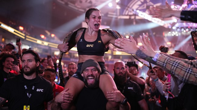 Amanda Nunes celebrating win and retirement announcement