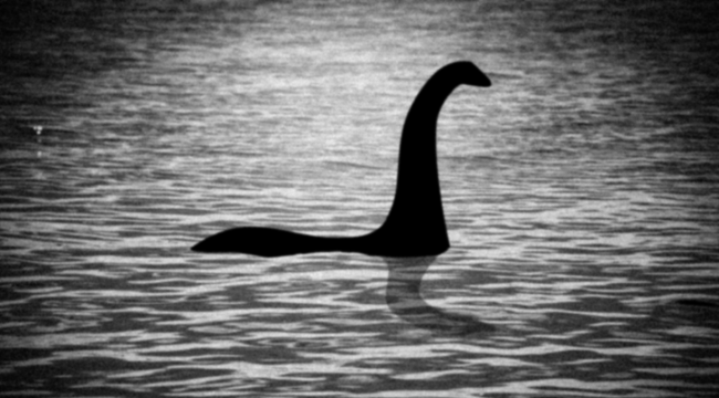 loch ness monster huge shape in water tourist