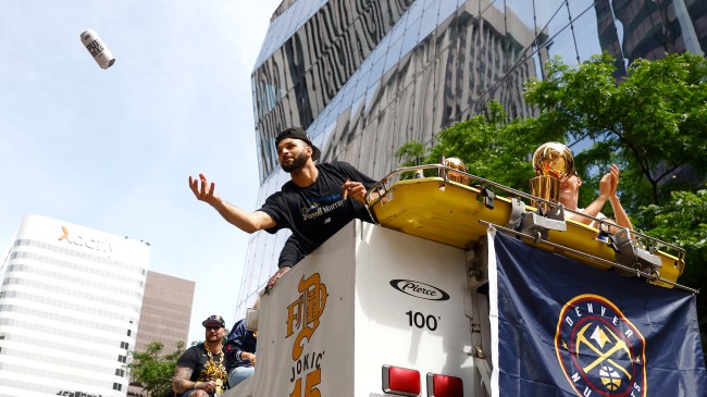 Beer tossed during Denver Nuggets victory parade