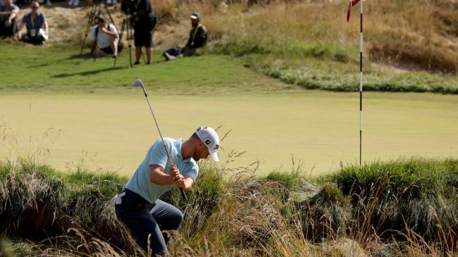 Wyndham Clark shoots a shot from the bunker at the US Open.