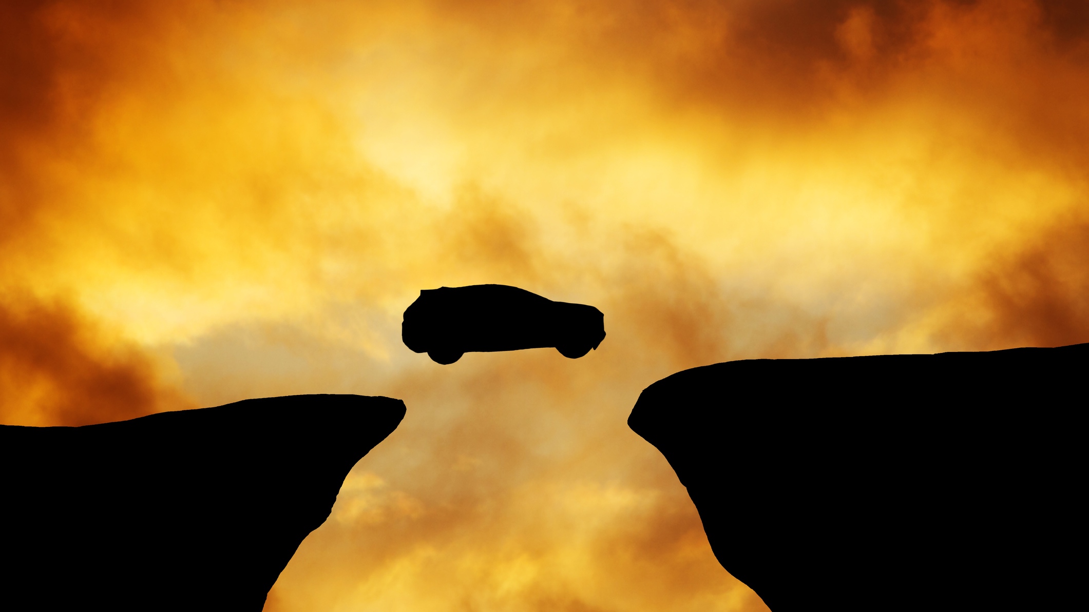 car flying off cliff