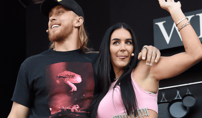 claire kittle and husband george on stage festival