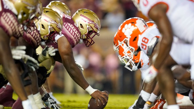 Clemson and Florida State players line up at the line of scrimmage.