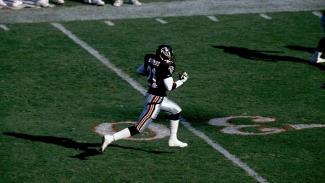 Deion Sanders retunring a punt