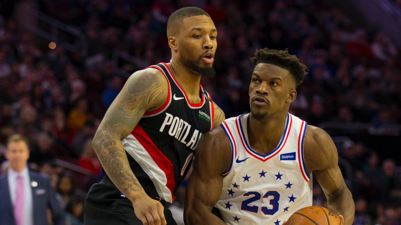 Damian Lillard and Jimmy Butler on the court