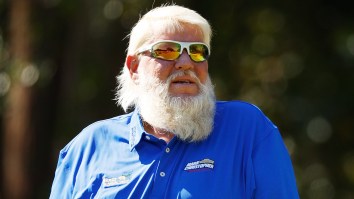 John Daly Goes Viral For Kicking A Barefoot Field Goal While Using His Shoe As A Tee