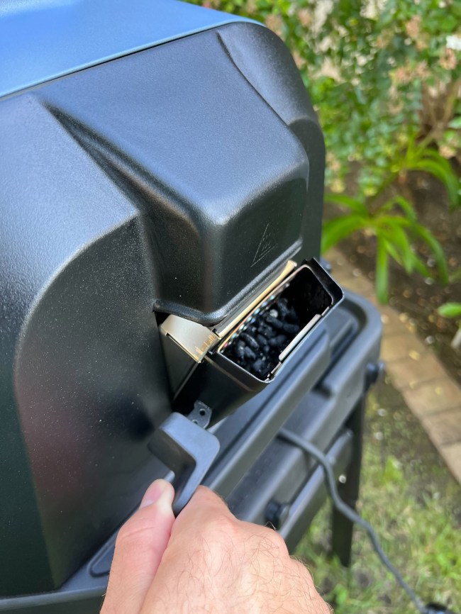 Burnt wood pellets after smoking on the Ninja Woodfire™ Pro Connect XL Outdoor Grill & Smoker