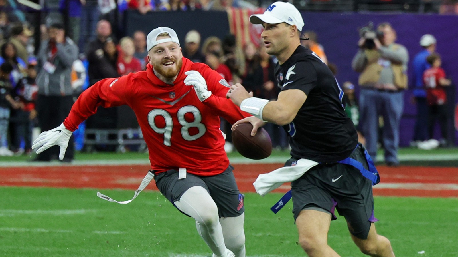 Kirk Cousins and Maxx Crosby