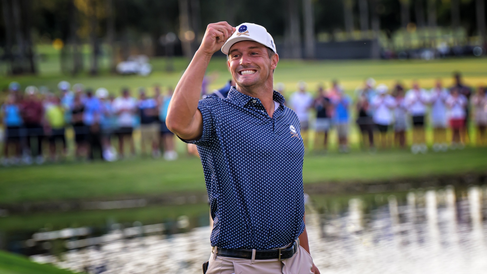 Bryson DeChambeau cheering and smiling