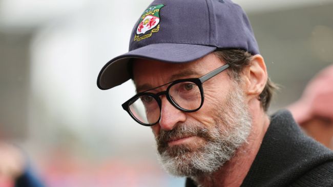 hugh jackman wearing a wrexham hat