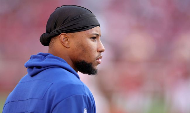 saquon barkley in a blue giants hoodie