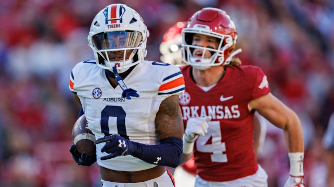 An Arkansas player tries to chase down Auburn's Koy Moore on a punt return.