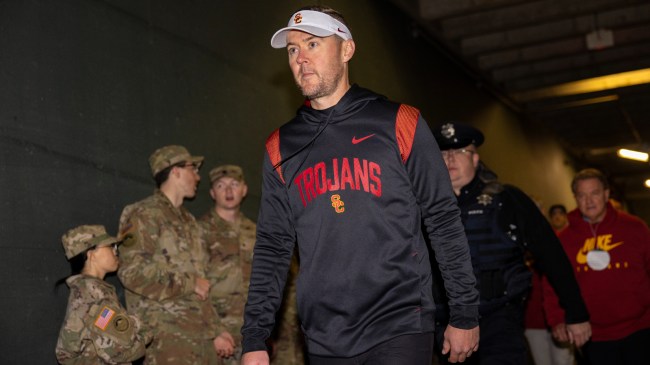 USC coach Lincoln Riley walks to the locker room during a game against Oregon.