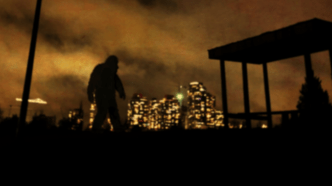 bigfoot yowie on edge of city at night