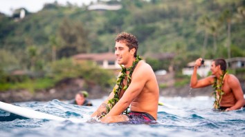 Pro Surfer Koa Rothman Tandem Surfing With His Model GF When They’re Visited By A Curious Sea Turtle