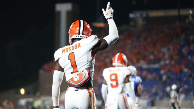 Andrew Mukuba celebrates during a game between Clemson and Duke.