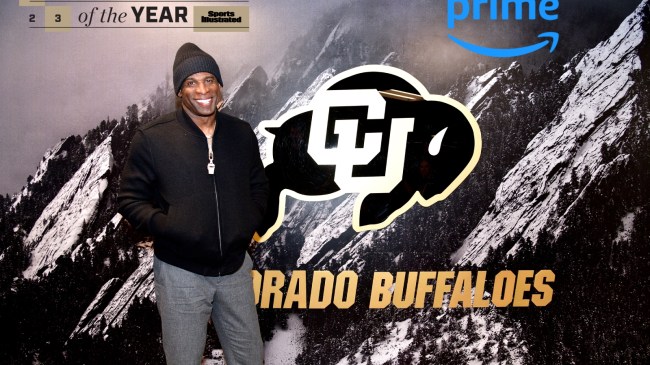 Deion Sanders poses for a photo after winning Sportsperson of the Year.