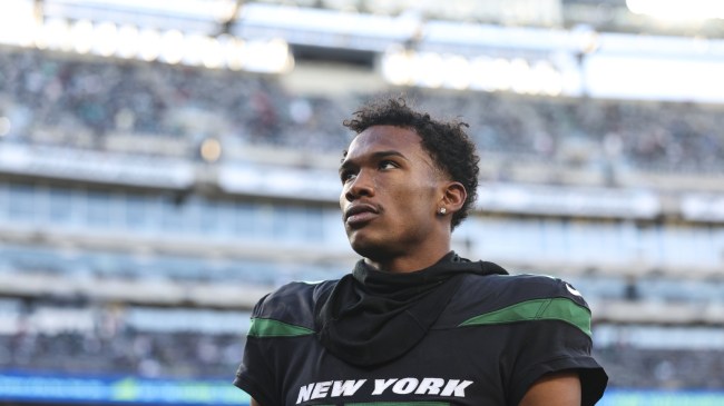 Garrett Wilson walks off the field after a Jets game.
