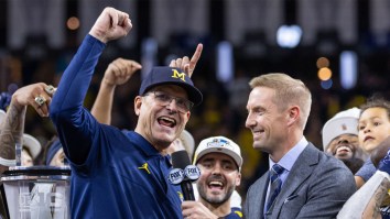 Jim Harbaugh Takes High Road, Shares Awkward Handshake With Big Ten Commish As Boos Rain Down