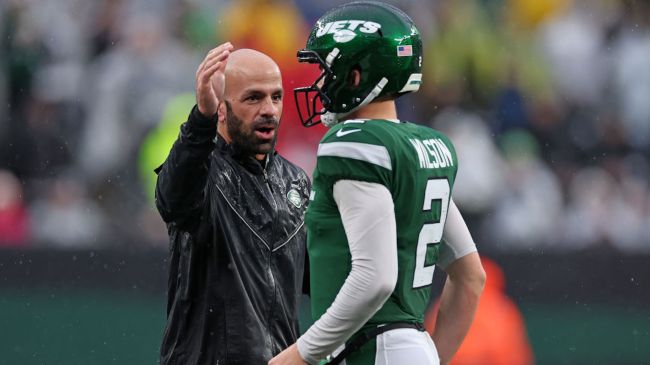 zach wilson and robert saleh high fiving