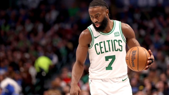 Jaylen Brown dribbles the ball in a game between the Celtics and Mavericks.