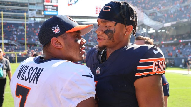 Justin Fields and Russell Wilson shakes hands after a game.