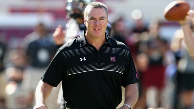 Interim HC Shawn Elliott on the field before a South Carolina football game.