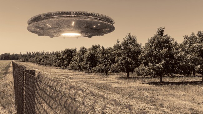 UFO foo fighter hovering over field