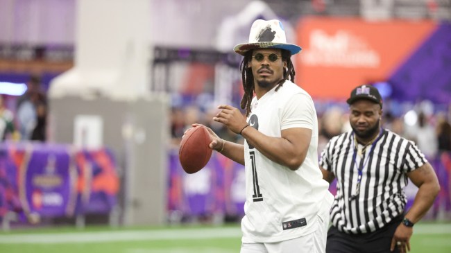 Cam Newton throws a pass at a celebrity flag football game in Las Vegas.