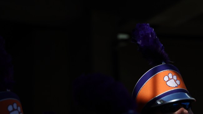 A Clemson logo on a marching band member's hat.