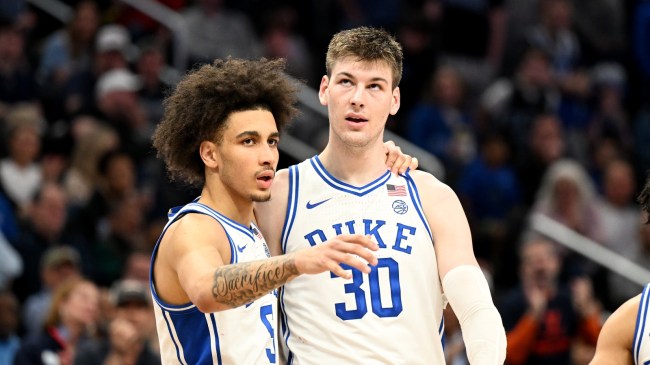Duke players communicate on the floor during a game against NC State.