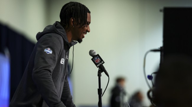 Jayden Daniels speaks at the NFL Combine.