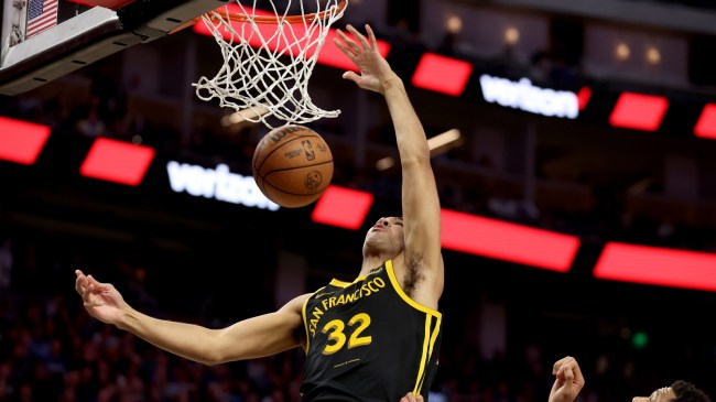Trayce Jackson-Davis throws down a slam dunk for the Golden State Warriors.