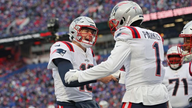 devante parker and mac jones celebrating a touchdown