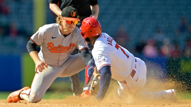 Jo Adell of the Los Angeles Angels is caught stealing on a tag by Gunnar Henderson
