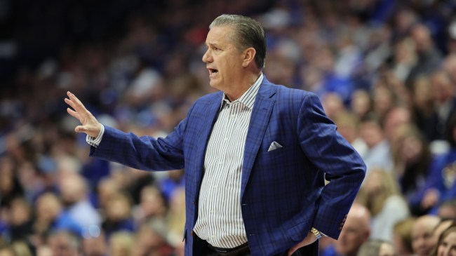 John Calipari talks to his Kentucky team from the bench during a win over Arkansas.
