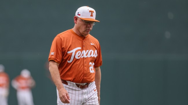 Texas head baseball coach David Pierce walks off the field.