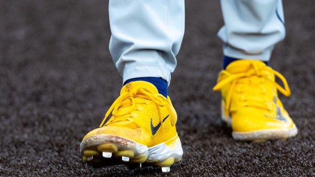 A West Virginia baseball player walks onto the field.