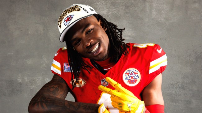 rashee rice chiefs poses with super bowl trophy