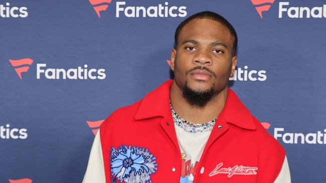 Micah Parsons poses for a photo at a Fanactics event.