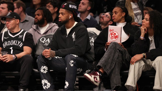 Damar Hamlin attends an NBA game.