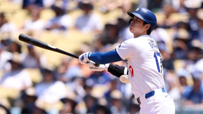 Shohei Ohtani watches after hitting a pitch.