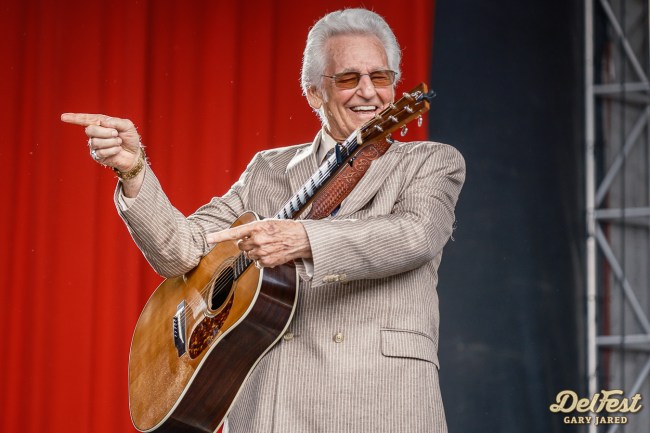 Del McCourey plays guitar at DelFest in Cumberland, Maryland