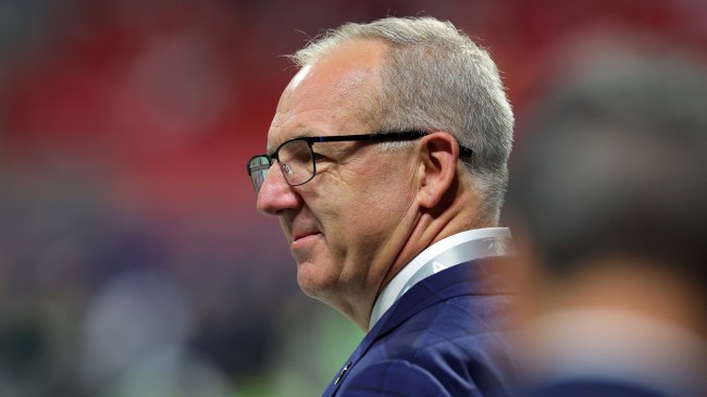 SEC Commissioner Greg Sankey stands on a football field.