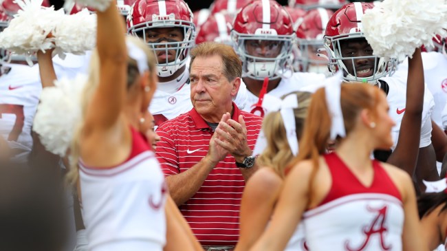 Nick Saban leads the Alabama football team onto the field vs. USF.
